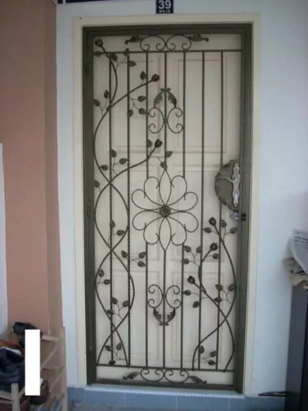 model teralis jendela besi ulir motif bunga