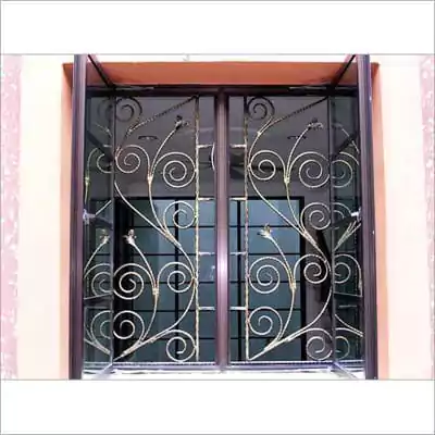 model teralis jendela besi ulir motif daun