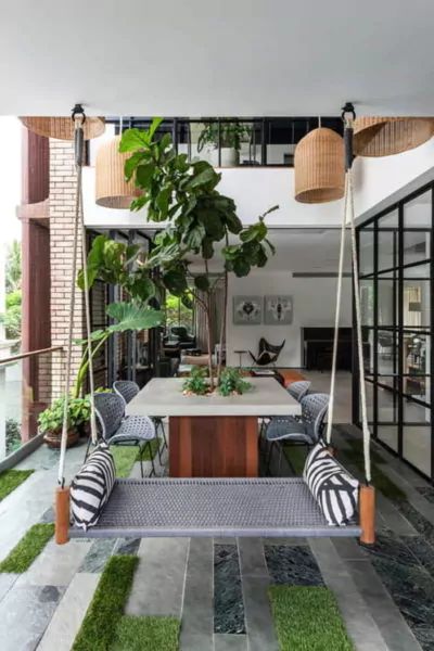 ruang tamu di teras rumah type 36 gaya industrial